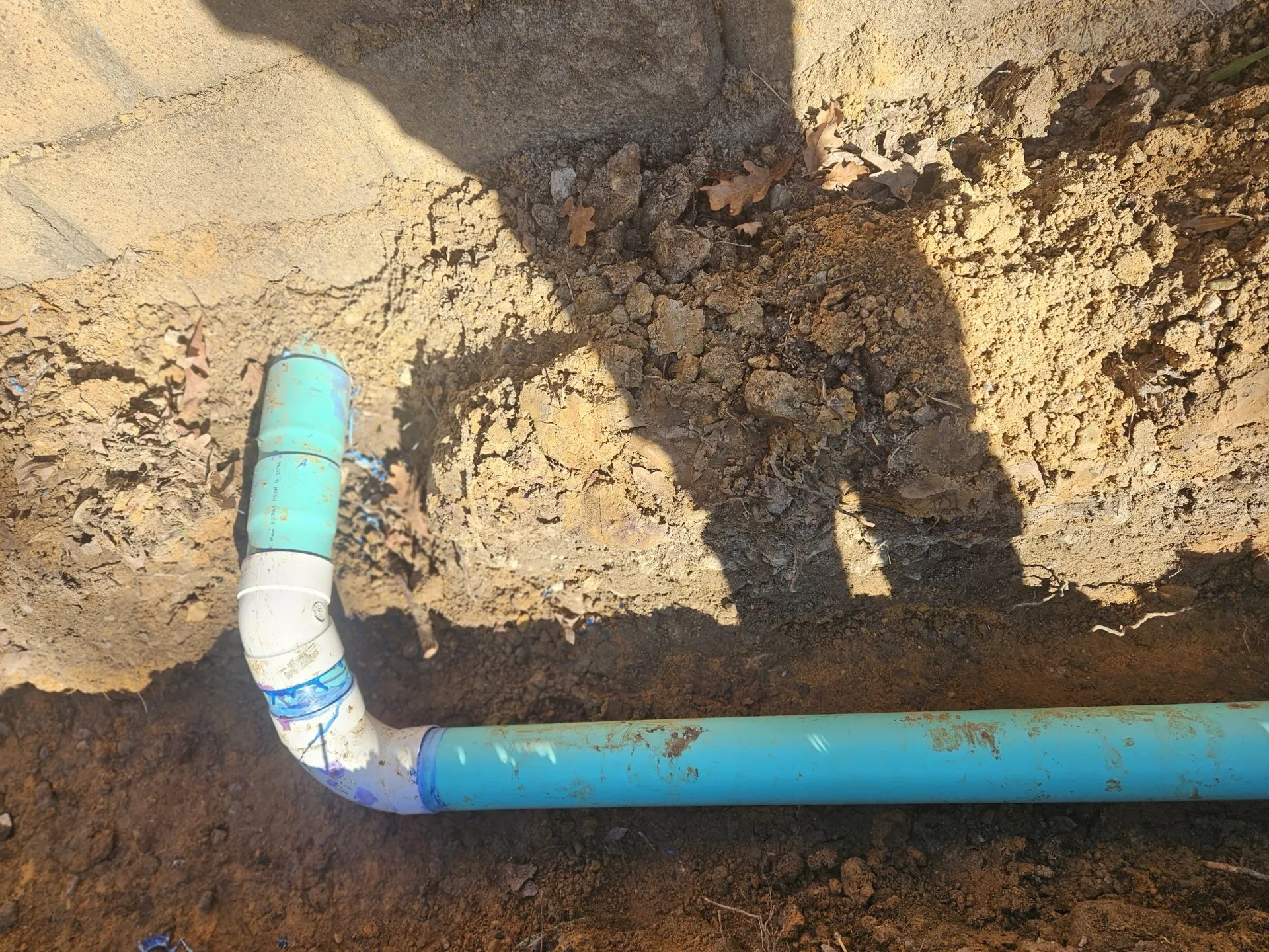 First erosion pavers being set along creek edge